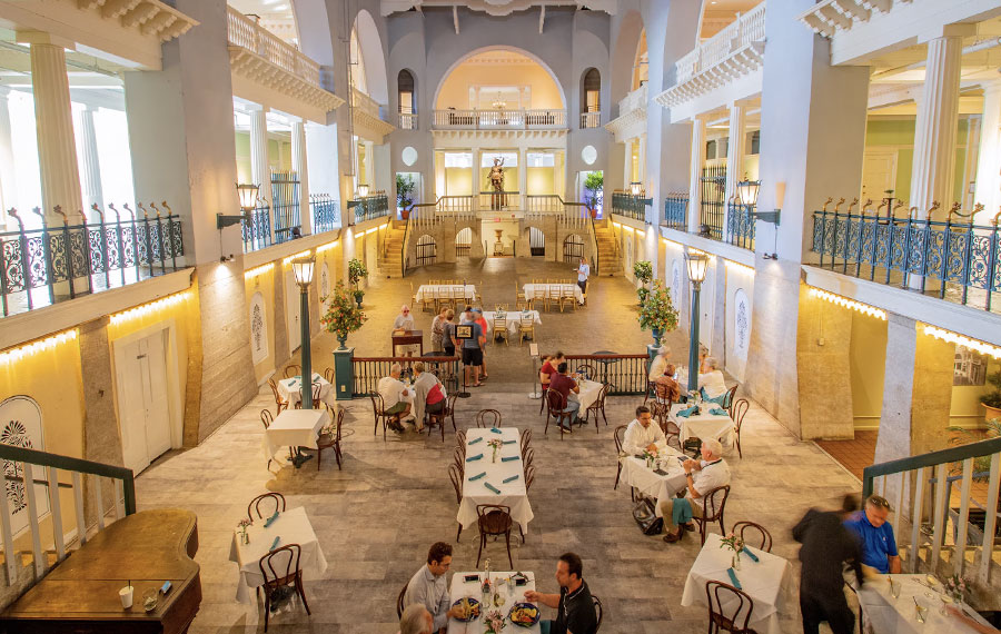 atrium with vaulted balconies dining area at lightner museum st augustine