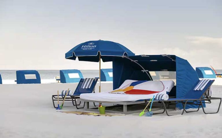 cabana on beach with loungers at hilton clearwater beach resort
