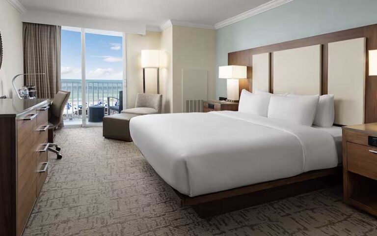 king size bed room with ocean view at hilton clearwater beach resort