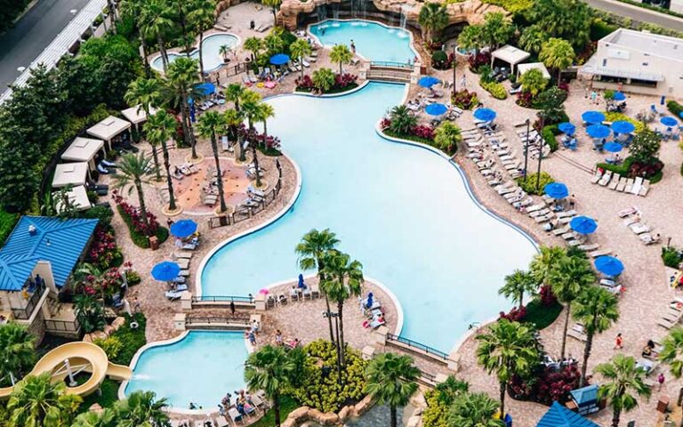 aerial view from above of pool area with slide and cabanas at hyatt regency hotel orlando