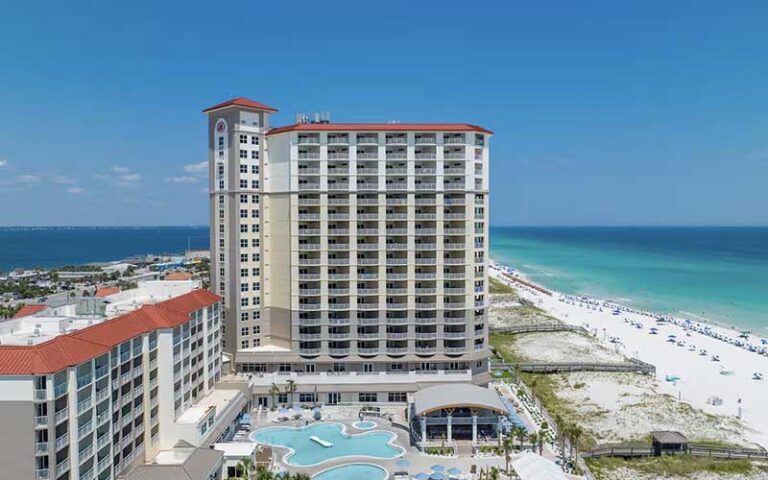 aerial view from side of high rise hotel with gulf and inlet at hilton pensacola beach