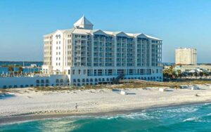 aerial view from water of hotel exterior at the pensacola beach resort