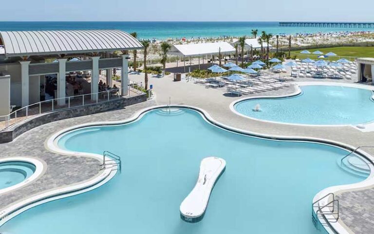 aerial view of deck with three curvy pools at hilton pensacola beach