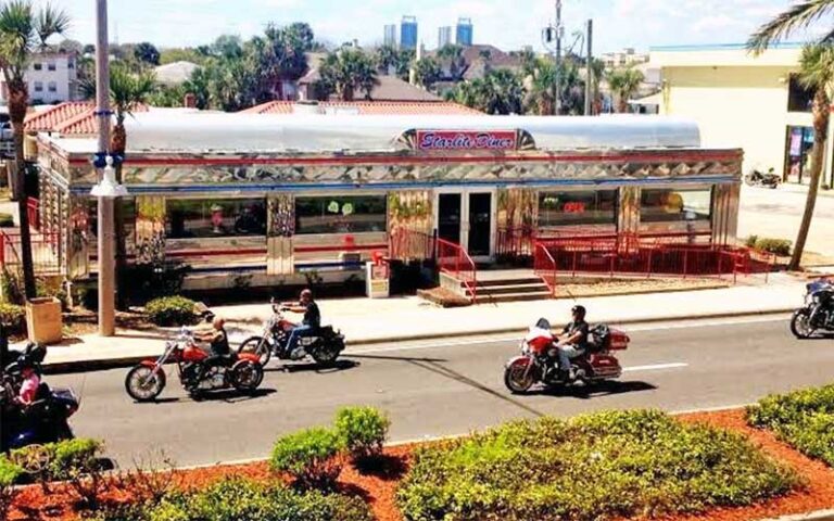 aerial view of diner with bikers driving past at starlite diner daytona beach