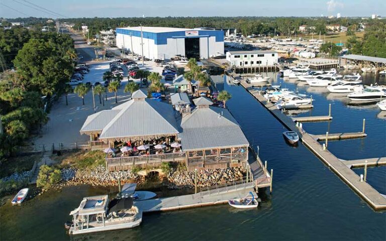 aerial view of dock restaurant on marina at the oar house pensacola