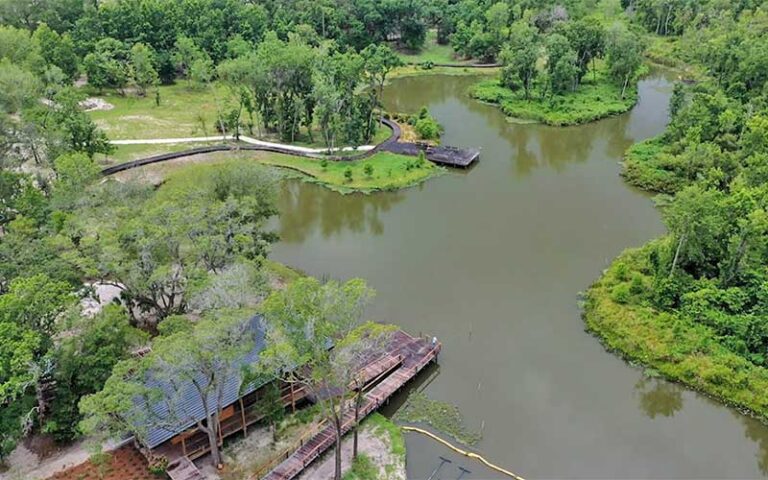 aerial view of pond with docks and path at bonnet springs park lakeland