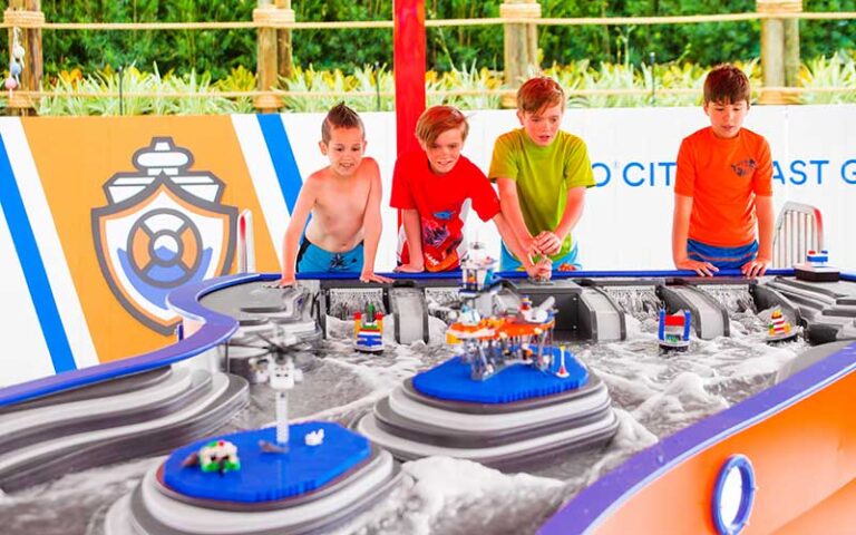 boys playing at build a boat table area at legoland florida water park winter haven