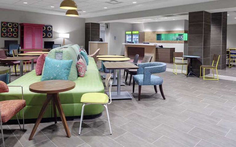breakfast cafe area with seating at home2 suites by hilton orlando south park