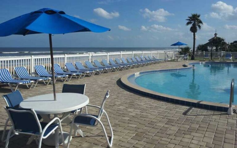 bricked patio pool area at coral sands inn seaside cottages ormond daytona beach