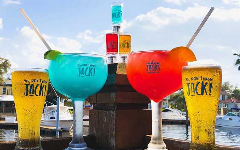 colorful branded drinks on patio overlooking marina at caribbean jacks daytona beach