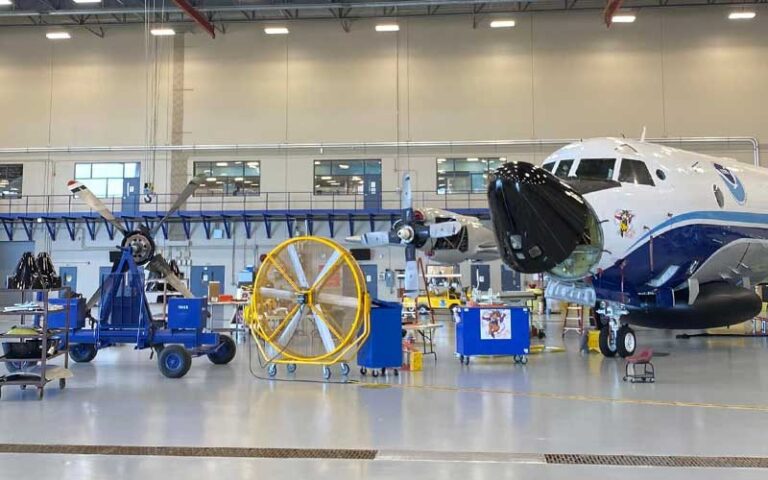 commercial jet with exhibits in hangar at florida air museum lakeland