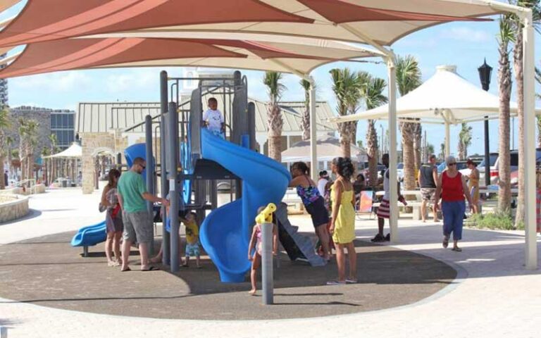 covered playground with kids at andy romano beachfront park ormond beach
