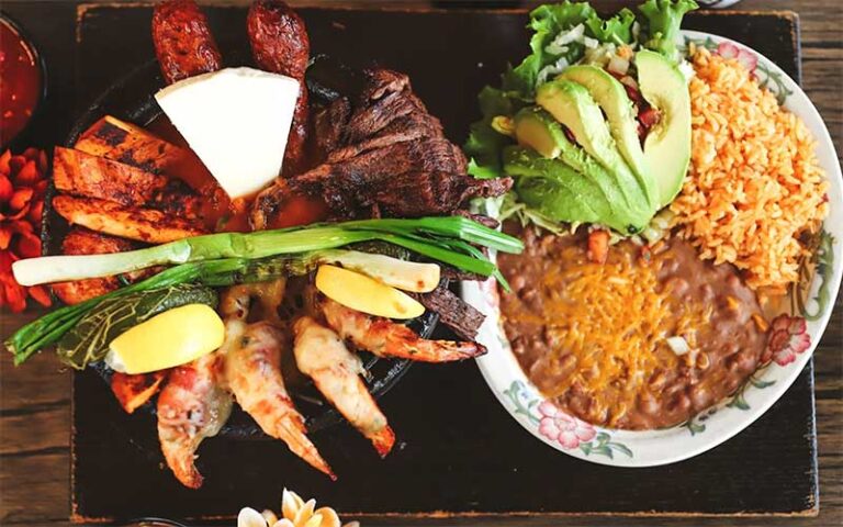 crab legs and skewered meats with sides at azteca d oro mexican restaurant winter haven