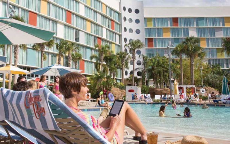 crowded pool area with loungers at universals cabana bay beach resort orlando