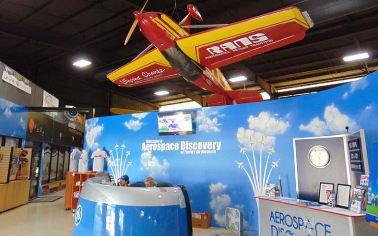 front desk with prop plane upside down at florida air museum lakeland