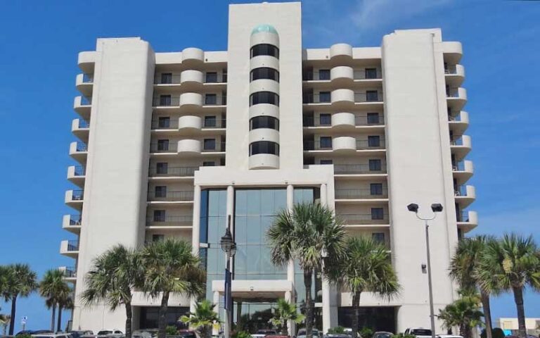 front exterior in daytime of high rise hotel at tropic shores resort daytona beach