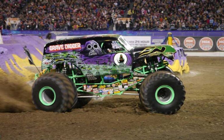 grave digger monster truck spinning in arena at camping world stadium orlando