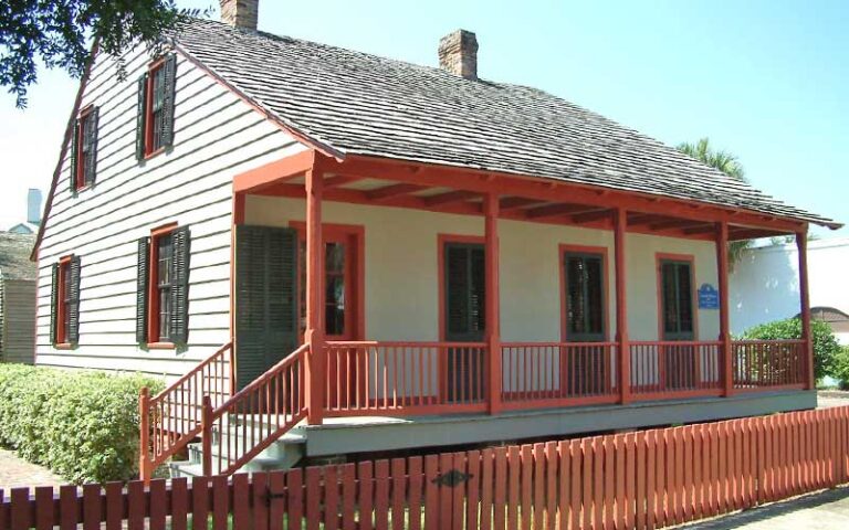historic house with orange trim at historic pensacola village