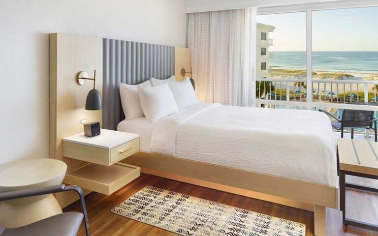 king bed suite with ocean view balcony at springhill suites pensacola beach