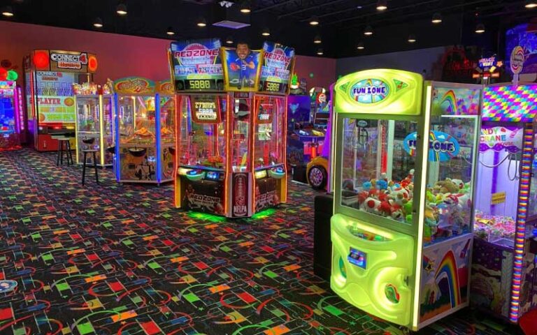 large arcade room with crane games at incredibowl entertainment winter haven