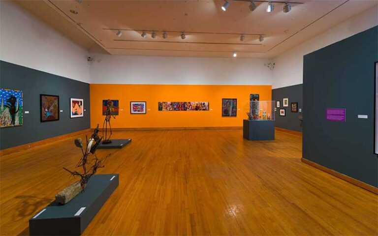 large room exhibit space with mixed media at polk museum of art lakeland