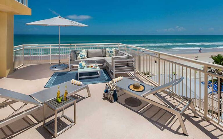 large terrace suite with loungers overlooking beach at the shores resort spa daytona beach