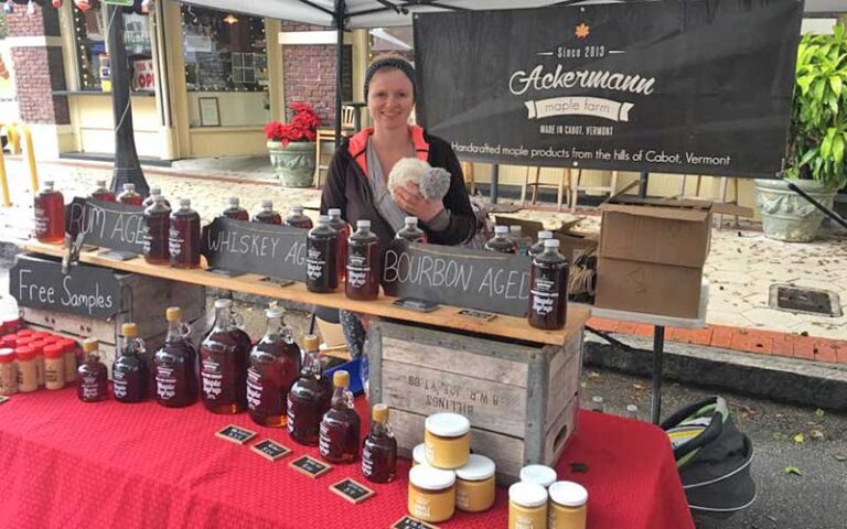 market booth with maple syrups at lakeland downtown farmers curb market