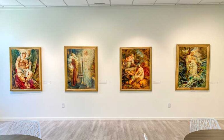 museum exhibit with four gold framed paintings at ormond memorial art museum gardens daytona beach