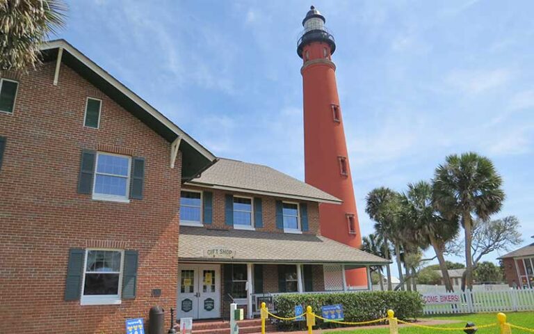 museum grounds with gift shop and lighthouse at ponce de leon inlet lighthouse museum daytona beach