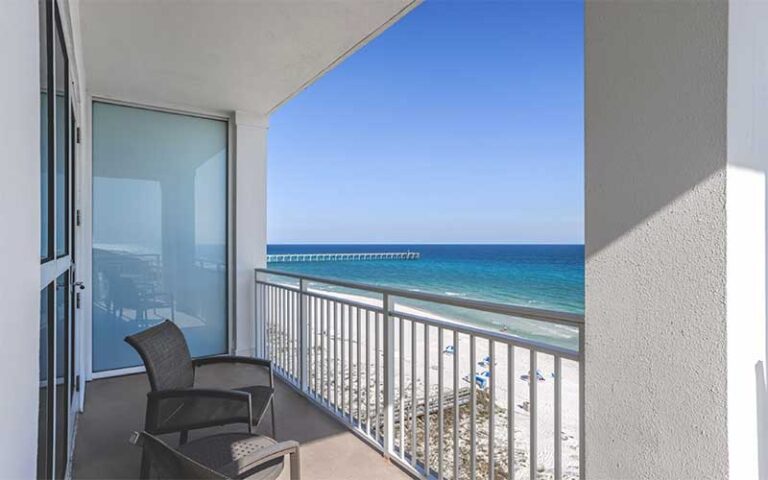 ocean view from balcony with chairs at the pensacola beach resort