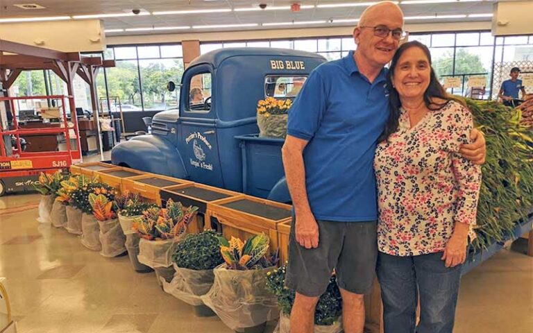owner man and wife with blue pickup in store at perrines produce port orange daytona beach