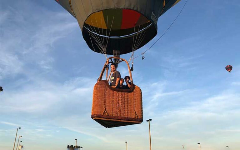 pilot with couple taking off in balloon basket at air hound adventures davenport orlando