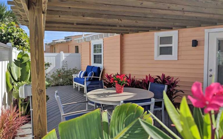 pink cottage patio with pergola at coral sands inn seaside cottages ormond daytona beach