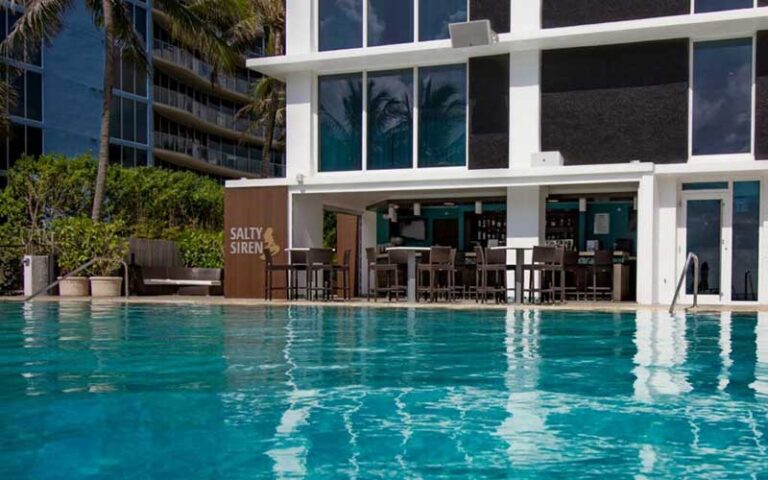 pool area with restaurant at b ocean resort fort lauderdale