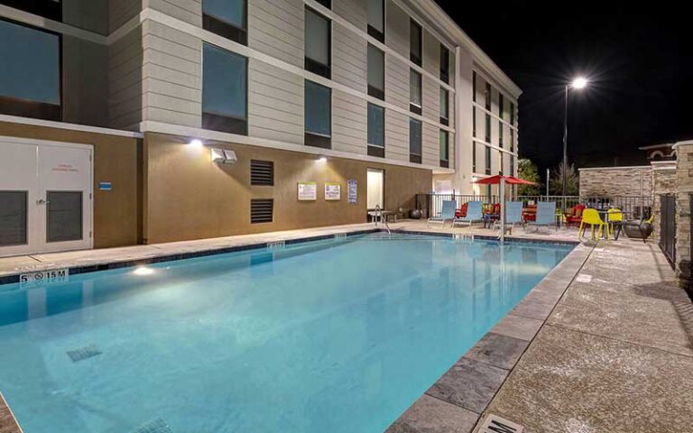 pool deck view at night at home2 suites by hilton gulf breeze pensacola area