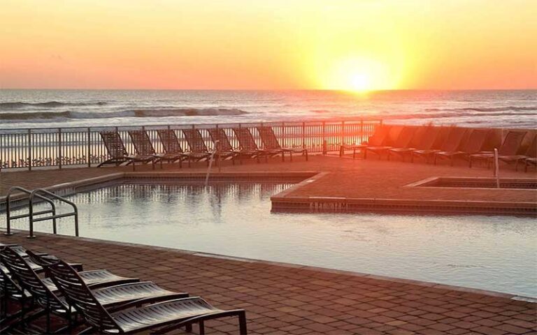 pool deck with sunrise at hyatt place daytona beach oceanfront