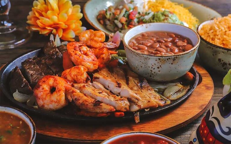shrimp steak and chicken fajitas and sides at azteca d oro mexican restaurant winter haven