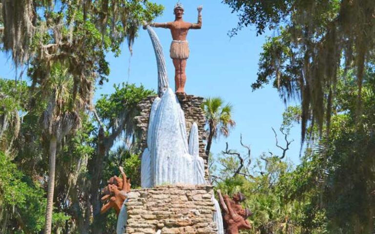 statue of natives with trees at tomoka state park ormond daytona beach