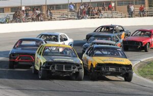 stock cars racing on track at auburndale speedway winter haven