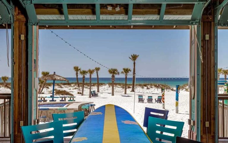 surfboard table dining patio at the pensacola beach resort