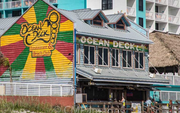 three story beachfront restaurant with colorful mural at ocean deck restaurant bar daytona beach