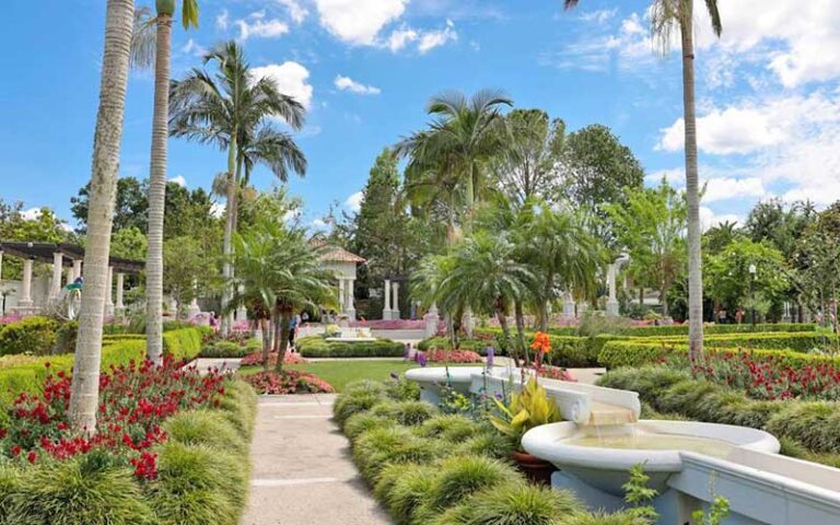 tropical garden with stone fountain at hollis garden lakeland