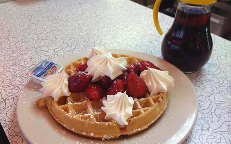 waffle with strawberries and whipped cream at starlite diner daytona beach