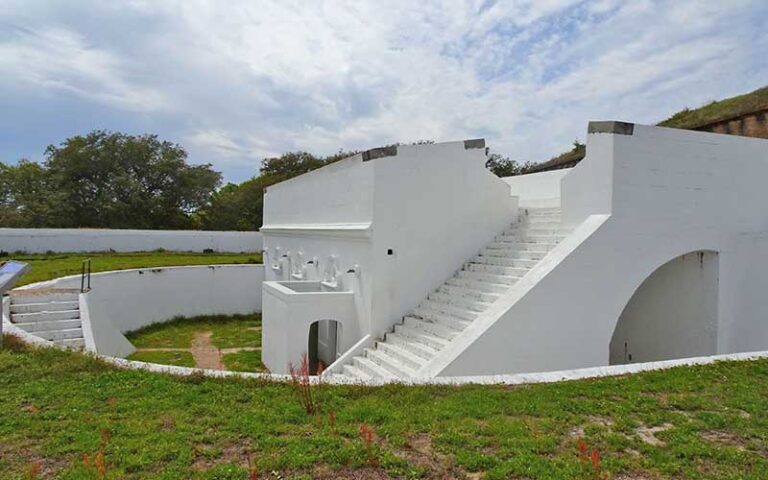 white fort structure with steps on hilltop at historic fort barrancas pensacola