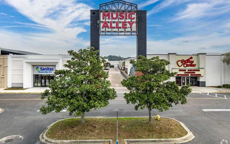 aerial from parking lot of mall with outdoor alley music venue at the centre of tallahassee