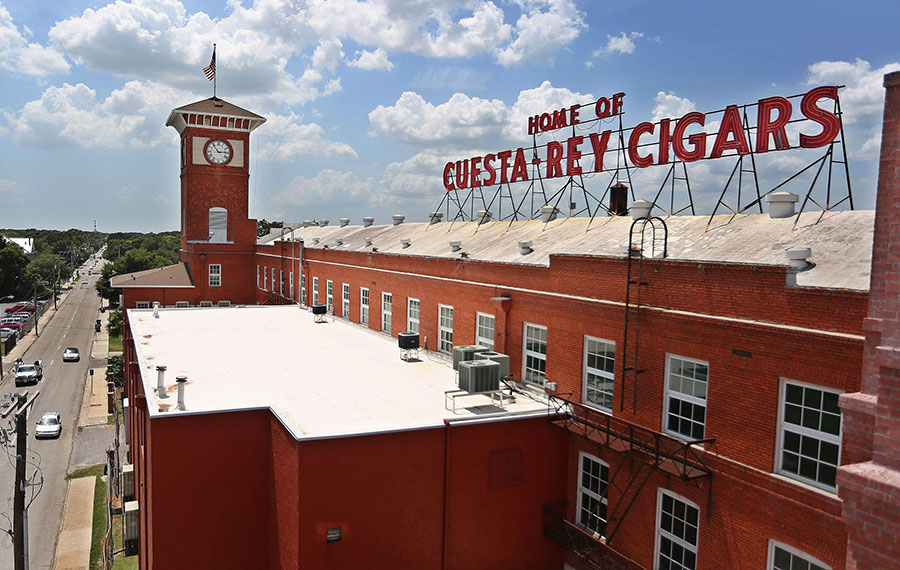 brick factory with clock and roof sign at 7th street cigar city ybor tampa