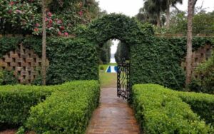 brick path gated garden with reflecting pool at alfred b maclay gardens state park tallahassee