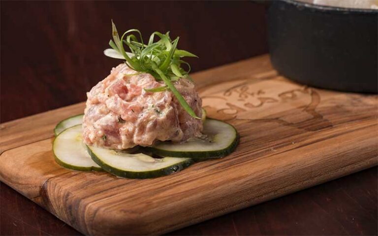 chicken salad with cucumber on carving board at the edison tallahassee