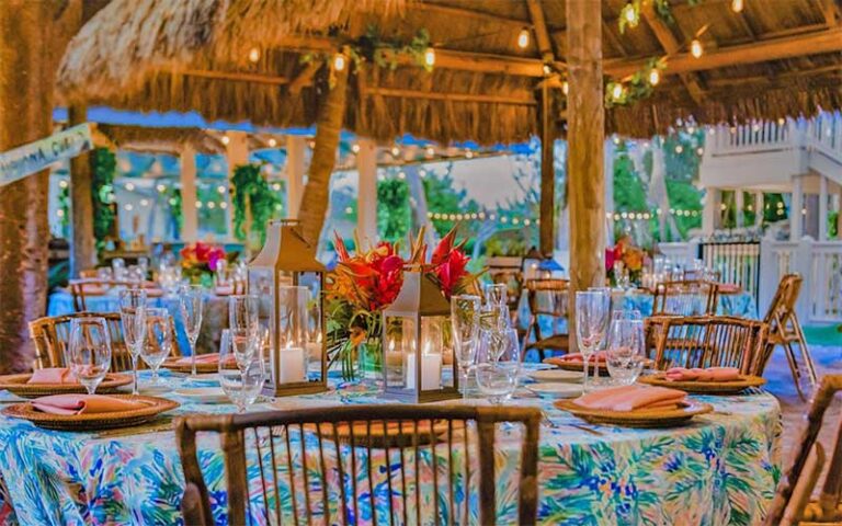 colorful patio dining table setup for service at havana cabana key west