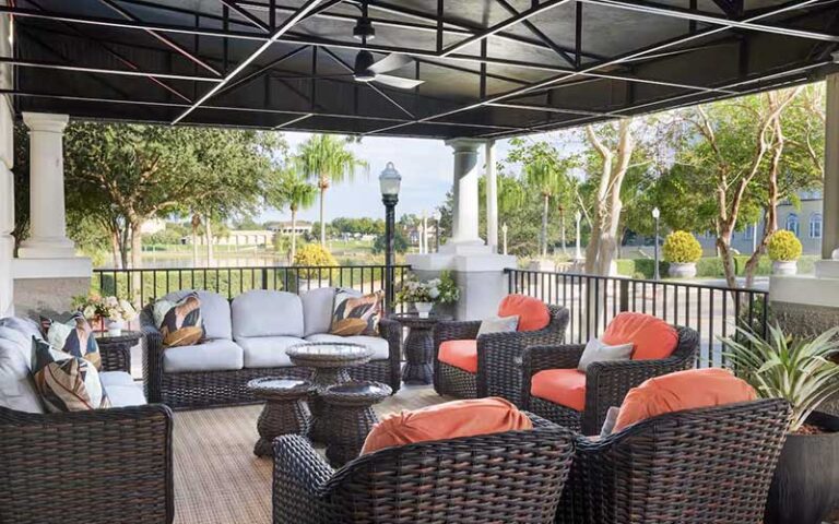 covered patio with lake view at the terrace hotel lakeland